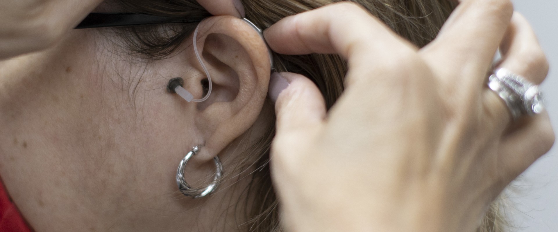 Why hearing aids are not covered by insurance?