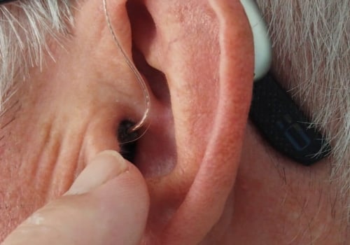 How long should you wear hearing aids in a day?